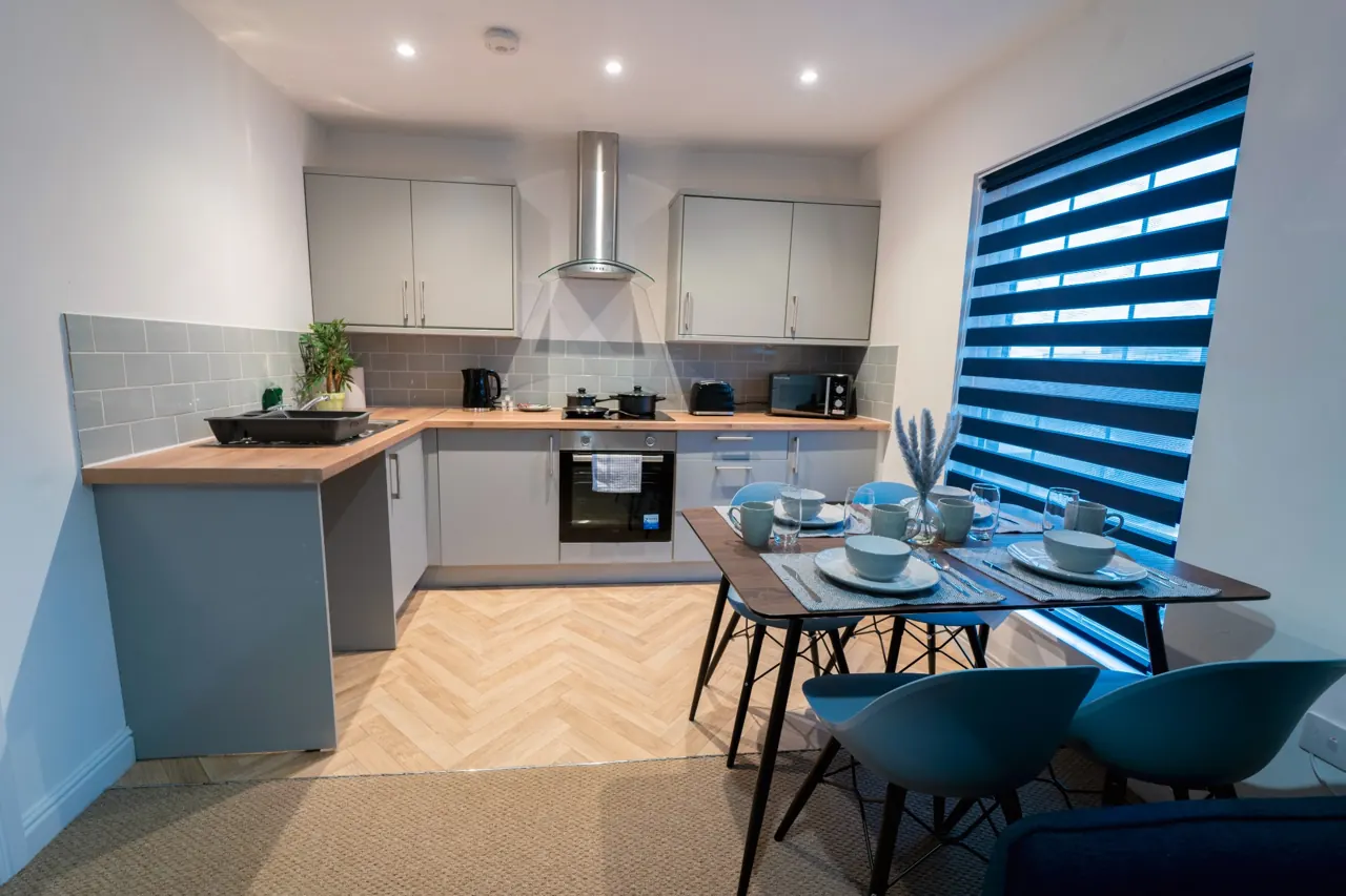 Kitchen and table set for guests