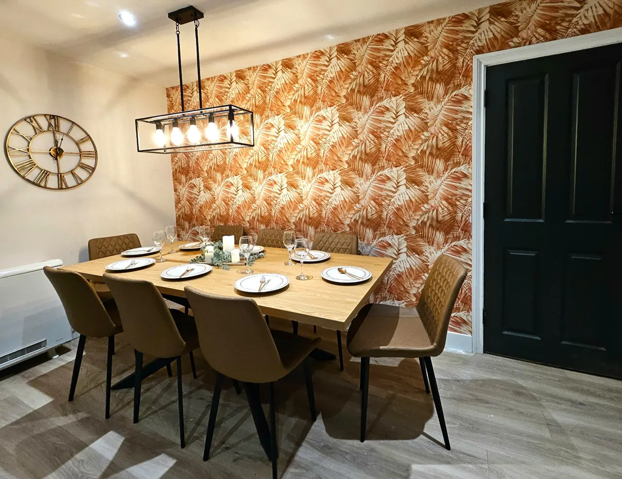 Dining room with a table set for guests