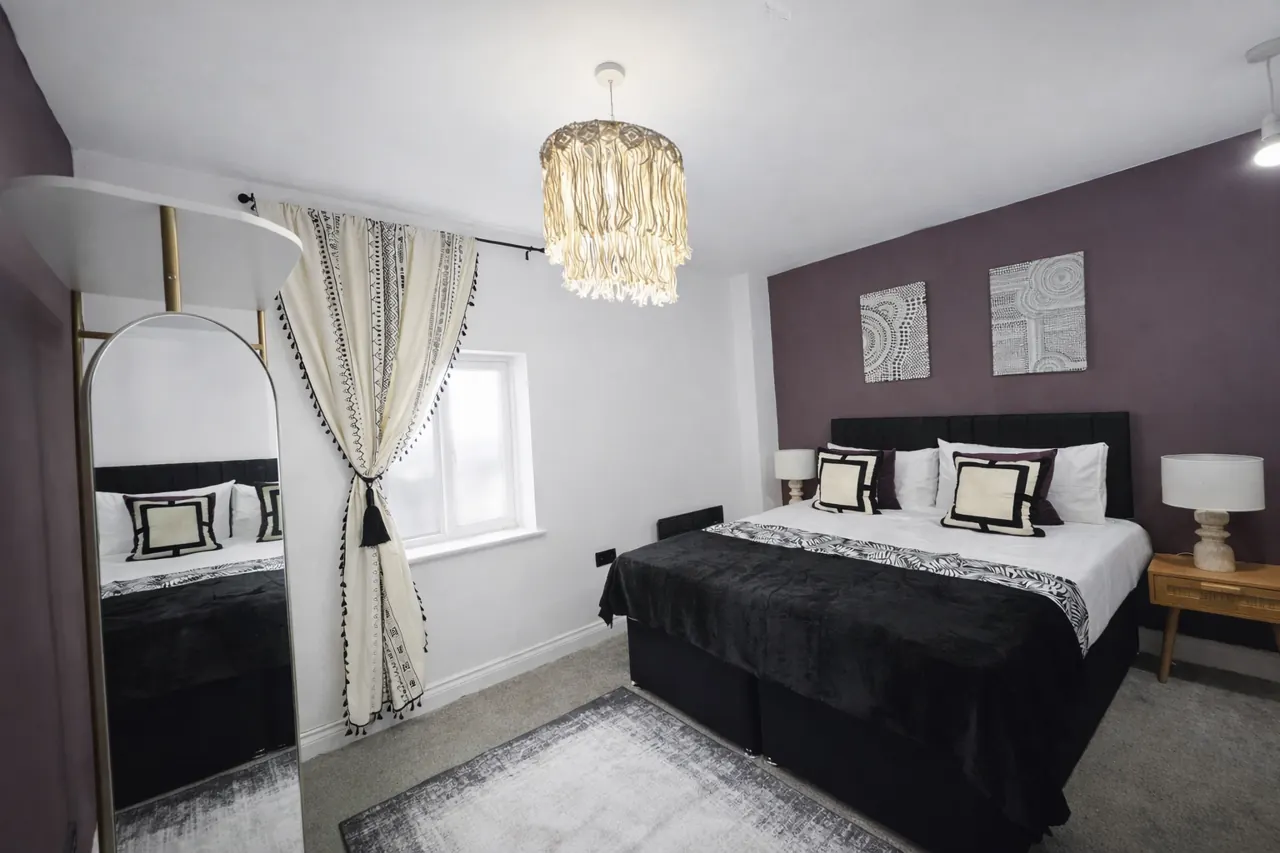 Bedroom four with bed and seating